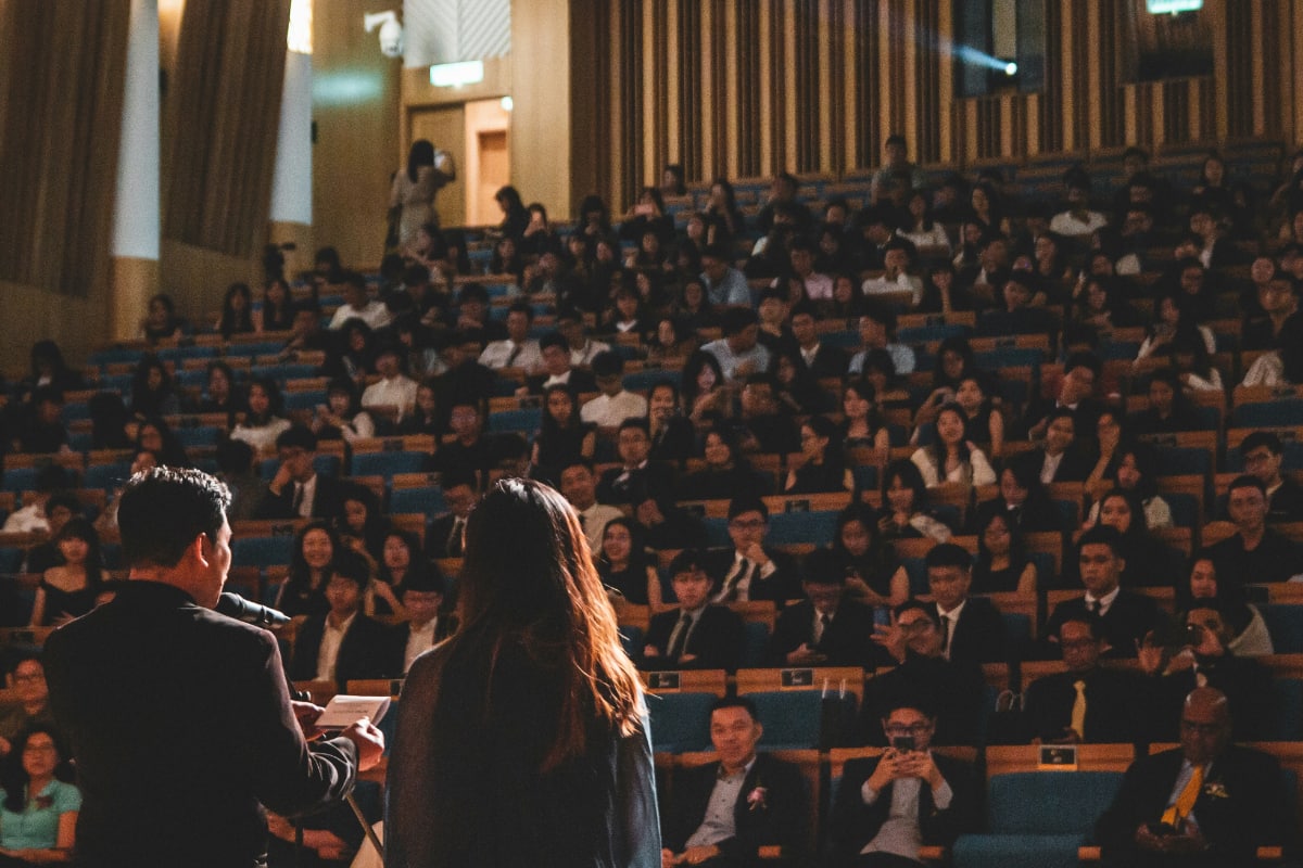 Lecturer in a university lecture hall