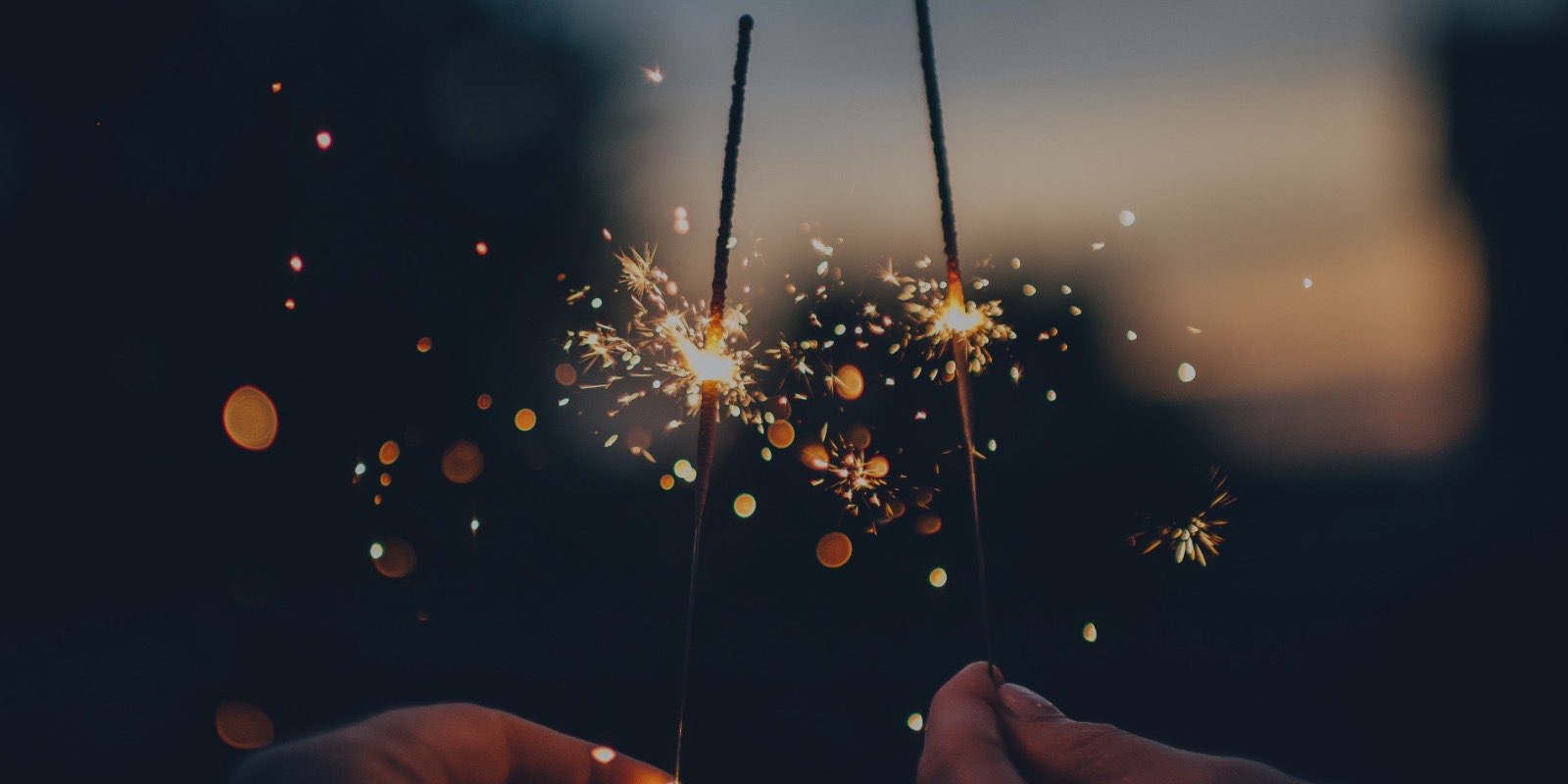 Sparklers in peoples' hands